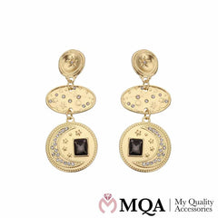 Øreringe med glitrende sten og guldfarvet stjerner