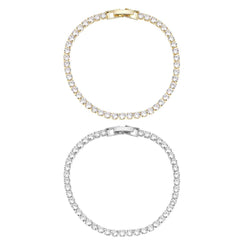 Armbånd, guld- eller sølvfarvet, mange glimtende sten, justerbar