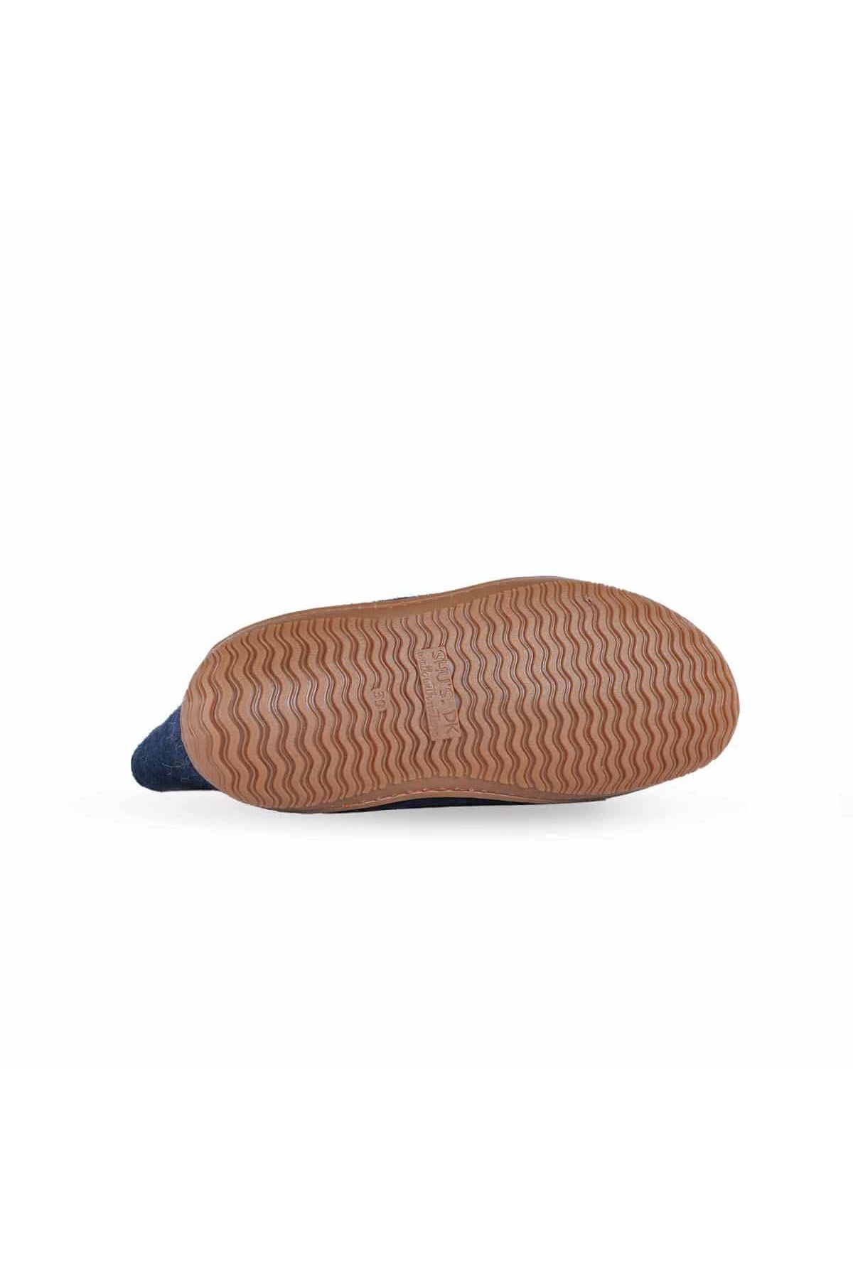 Håndlavede blå uld støvle fra Shus.dk, lavet af 100% New Zealandsk uld, sikrer varme og komfort. Med høj skaft og natur gummisål. Dansk design.